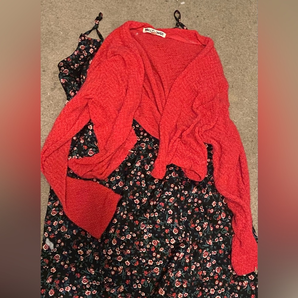 cute floral black slim fit dress with small complimentary red sweater